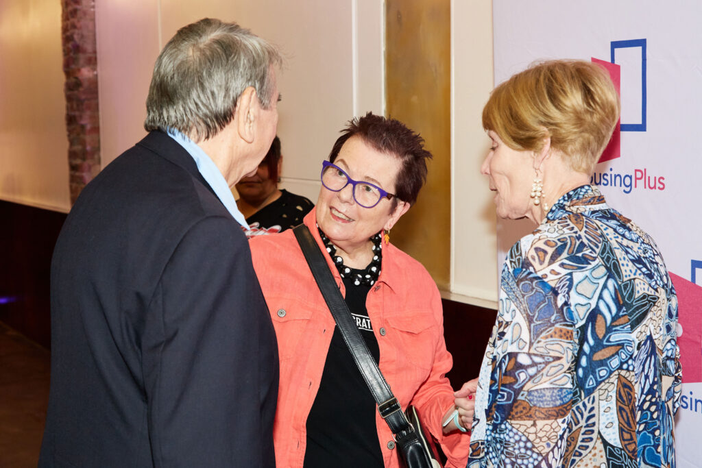 Rita Zimmer speaks with people
