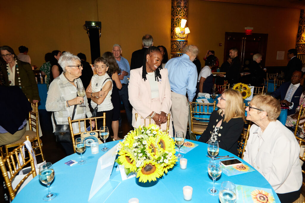 People chatting happily at a banquet table