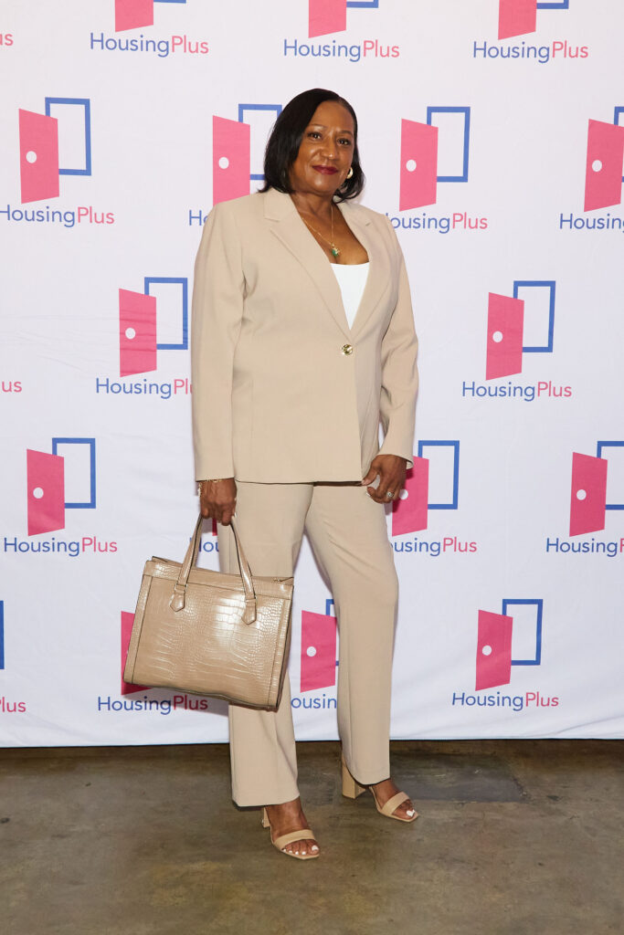 Jade Lee, HousingPlus staff, in smart business attire