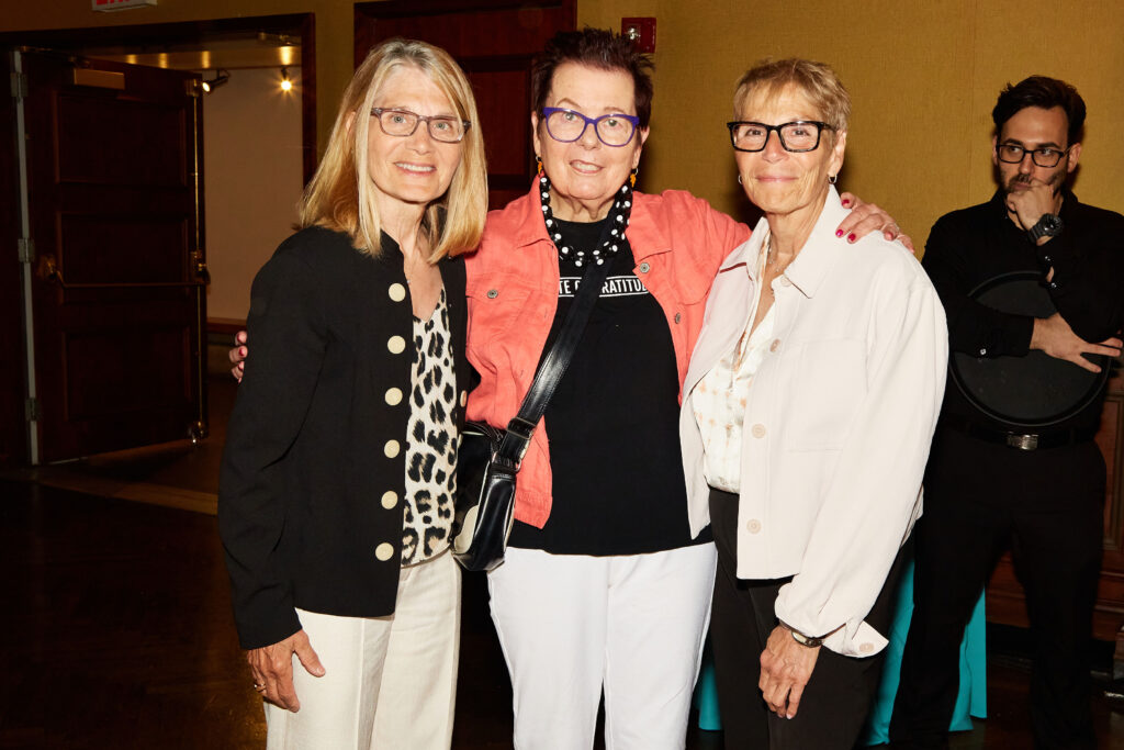 Three women wearing glasses