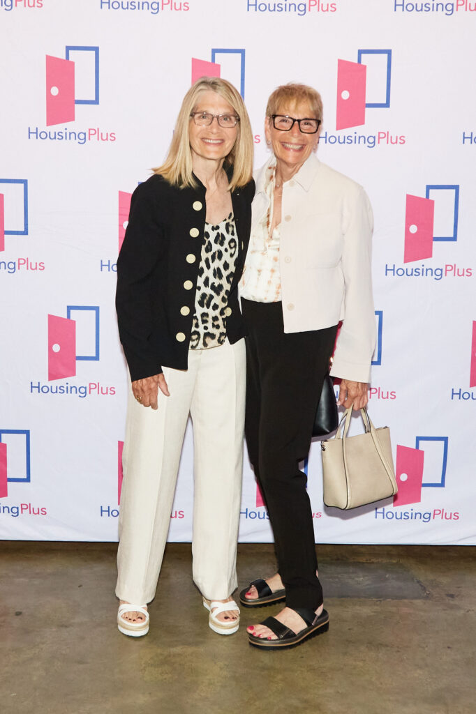 Two women smiling