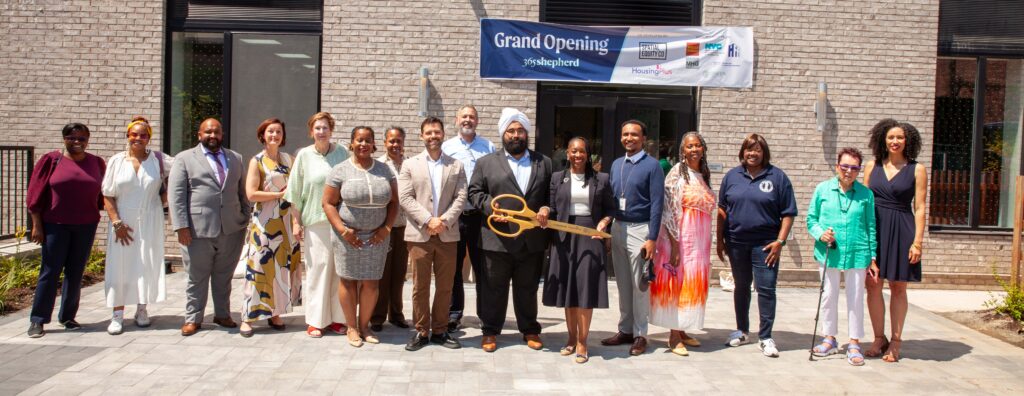 Large group with giant scissors