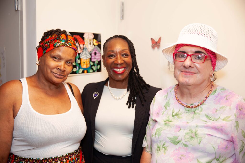Karen Ford, CEO, with HousingPlus tenants